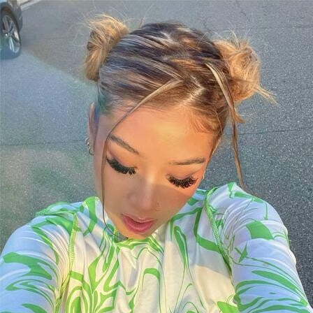 12 Space Bun Hairstyles to Make a Statement with Your Swag